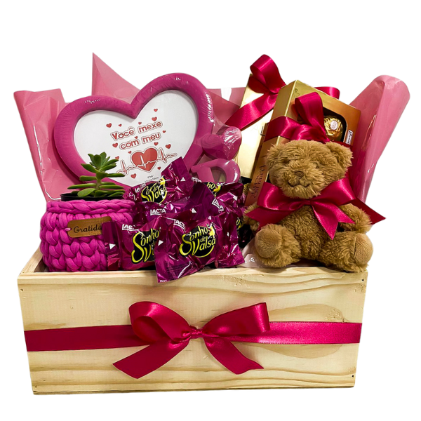 cesta de chocolate com pelúcia