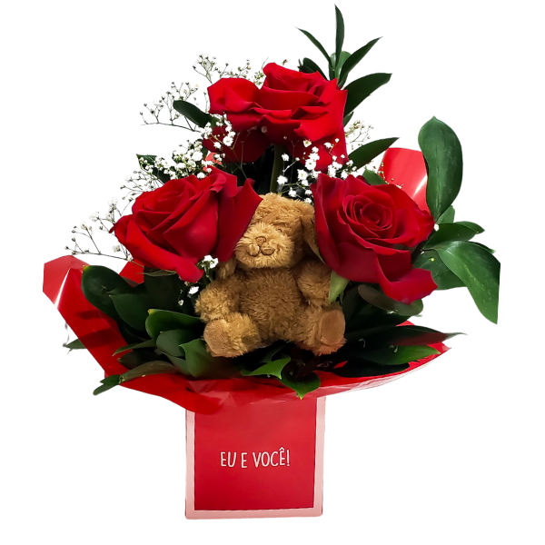 arranjo de rosas vermelhas com pelucia