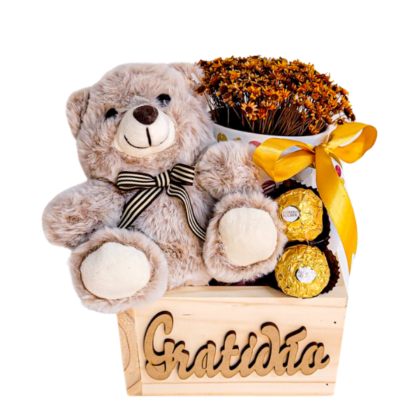 cesta de chocolate com pelucia