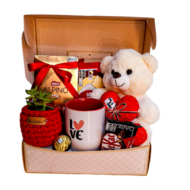 cesta de chocolate com pelucia